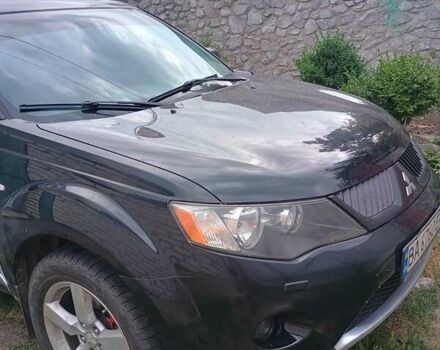 Черный Мицубиси Аутлендер, объемом двигателя 1.97 л и пробегом 218 тыс. км за 10500 $, фото 1 на Automoto.ua