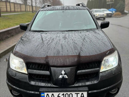 Чорний Міцубісі Аутлендер, об'ємом двигуна 2.4 л та пробігом 169 тис. км за 8000 $, фото 1 на Automoto.ua
