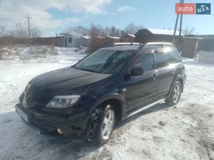 Мицубиси Аутлендер 2007 в Нежине на Automoto.ua Черный Мицубиси Аутлендер, объемом двигателя 2.38 л и пробегом 190 тыс. км за 6200 $, фото 1 на Automoto.ua