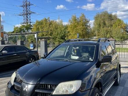 Мицубиси Аутлендер 2007 в Львове на Automoto.ua Черный Мицубиси Аутлендер, объемом двигателя 2.38 л и пробегом 217 тыс. км за 6199 $, фото 1 на Automoto.ua