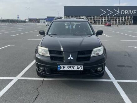 Чорний Міцубісі Аутлендер, об'ємом двигуна 2.38 л та пробігом 180 тис. км за 6900 $, фото 1 на Automoto.ua