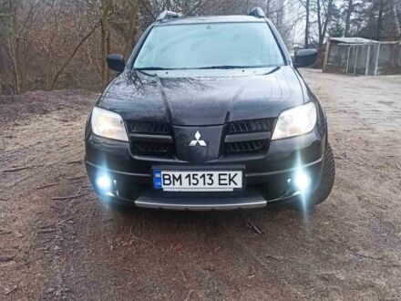 Мицубиси Аутлендер 2007 в Сумах на Automoto.ua Черный Мицубиси Аутлендер, объемом двигателя 2 л и пробегом 235 тыс. км за 7350 $, фото 1 на Automoto.ua