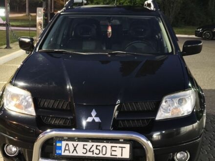 Мицубиси Аутлендер 2007 в Харькове на Automoto.ua Черный Мицубиси Аутлендер, объемом двигателя 2.4 л и пробегом 203 тыс. км за 7200 $, фото 1 на Automoto.ua