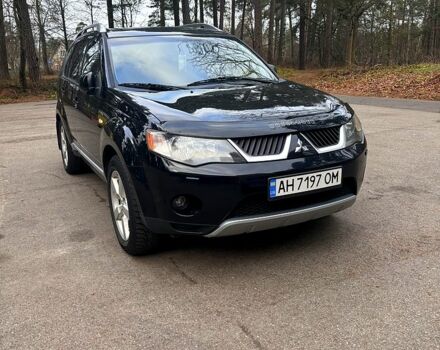 Черный Мицубиси Аутлендер, объемом двигателя 3 л и пробегом 258 тыс. км за 9200 $, фото 1 на Automoto.ua