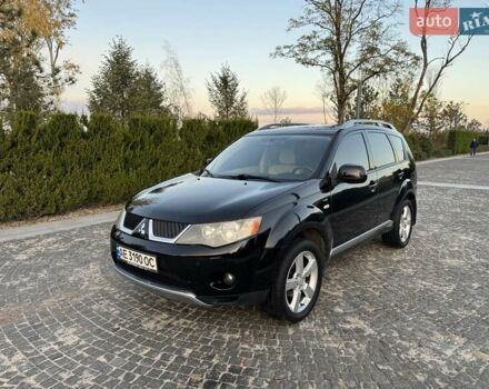 Черный Мицубиси Аутлендер, объемом двигателя 3 л и пробегом 205 тыс. км за 11300 $, фото 1 на Automoto.ua
