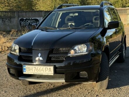 Мицубиси Аутлендер 2007 в Белгород-Днестровском на Automoto.ua Черный Мицубиси Аутлендер, объемом двигателя 2.4 л и пробегом 242 тыс. км за 7500 $, фото 1 на Automoto.ua