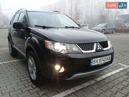 Чорний Міцубісі Аутлендер, об'ємом двигуна 2 л та пробігом 250 тис. км за 9350 $, фото 1 на Automoto.ua