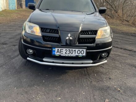 Міцубісі Аутлендер 2007 у Синельниковом на Automoto.ua Чорний Міцубісі Аутлендер, об'ємом двигуна 2.4 л та пробігом 340 тис. км за 7600 $, фото 1 на Automoto.ua