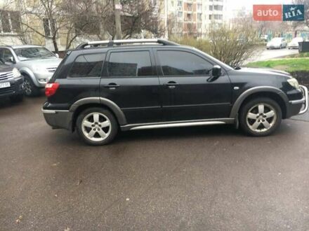 Мицубиси Аутлендер 2007 в Киеве на Automoto.ua Черный Мицубиси Аутлендер, объемом двигателя 2 л и пробегом 330 тыс. км за 7000 $, фото 1 на Automoto.ua