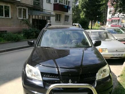 Мицубиси Аутлендер 2007 в Тернополе на Automoto.ua Черный Мицубиси Аутлендер, объемом двигателя 2 л и пробегом 243 тыс. км за 6950 $, фото 1 на Automoto.ua