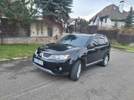 Черный Мицубиси Аутлендер, объемом двигателя 3 л и пробегом 220 тыс. км за 9000 $, фото 1 на Automoto.ua