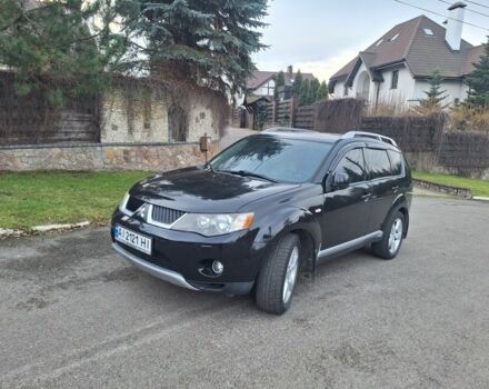 Черный Мицубиси Аутлендер, объемом двигателя 3 л и пробегом 220 тыс. км за 9000 $, фото 1 на Automoto.ua