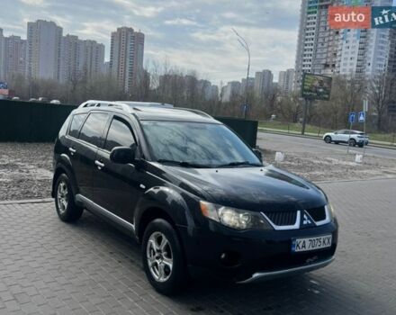 Черный Мицубиси Аутлендер, объемом двигателя 2.4 л и пробегом 277 тыс. км за 7350 $, фото 1 на Automoto.ua