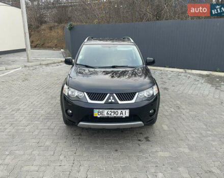 Черный Мицубиси Аутлендер, объемом двигателя 3 л и пробегом 265 тыс. км за 9200 $, фото 1 на Automoto.ua