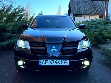 Міцубісі Аутлендер 2007 у Новомосковске на Automoto.ua Чорний Міцубісі Аутлендер, об'ємом двигуна 2 л та пробігом 167 тис. км за 8600 $, фото 1 на Automoto.ua