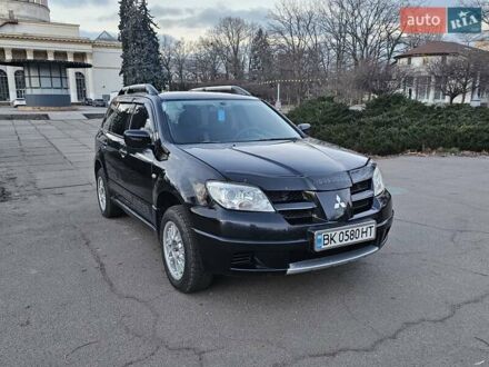 Чорний Міцубісі Аутлендер, об'ємом двигуна 2 л та пробігом 290 тис. км за 4500 $, фото 1 на Automoto.ua