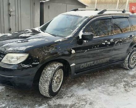Чорний Міцубісі Аутлендер, об'ємом двигуна 2 л та пробігом 290 тис. км за 4850 $, фото 1 на Automoto.ua