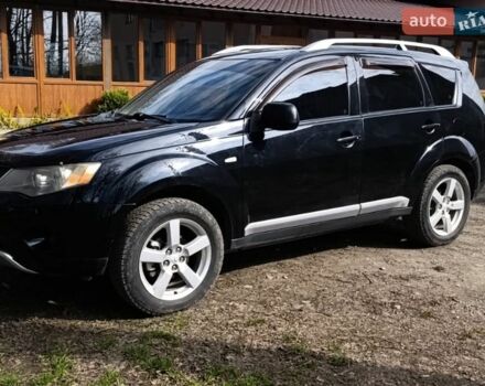 Черный Мицубиси Аутлендер, объемом двигателя 3 л и пробегом 315 тыс. км за 8500 $, фото 1 на Automoto.ua