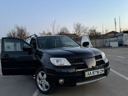 Чорний Міцубісі Аутлендер, об'ємом двигуна 2.38 л та пробігом 147 тис. км за 7200 $, фото 1 на Automoto.ua