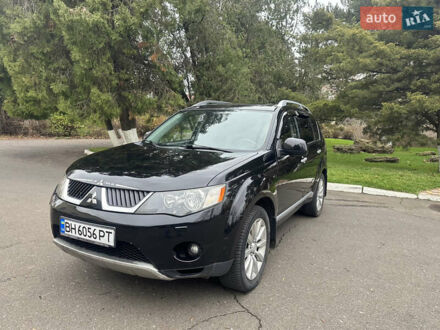 Чорний Міцубісі Аутлендер, об'ємом двигуна 2.4 л та пробігом 230 тис. км за 8300 $, фото 1 на Automoto.ua