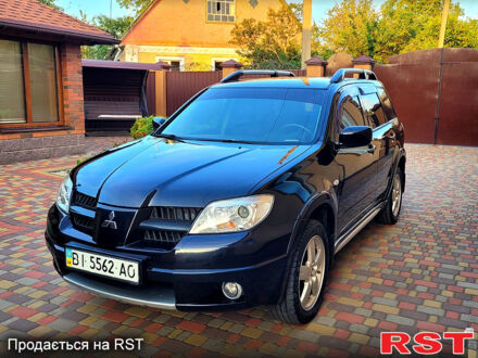Міцубісі Аутлендер 2007 у Миргороде на Automoto.ua Чорний Міцубісі Аутлендер, об'ємом двигуна 2.4 л та пробігом 152 тис. км за 7250 $, фото 1 на Automoto.ua