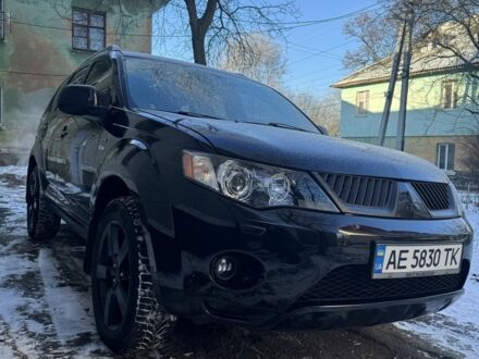 Черный Мицубиси Аутлендер, объемом двигателя 3 л и пробегом 228 тыс. км за 10000 $, фото 1 на Automoto.ua