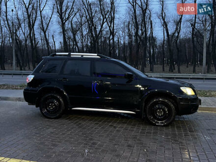 Мицубиси Аутлендер 2007 в Днепре (Днепропетровске) на Automoto.ua Черный Мицубиси Аутлендер, объемом двигателя 2.4 л и пробегом 264 тыс. км за 6999 $, фото 1 на Automoto.ua
