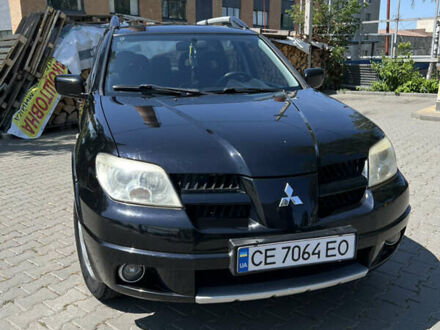 Міцубісі Аутлендер 2007 у Чернівцях на Automoto.ua Чорний Міцубісі Аутлендер, об'ємом двигуна 2 л та пробігом 238 тис. км за 6200 $, фото 1 на Automoto.ua