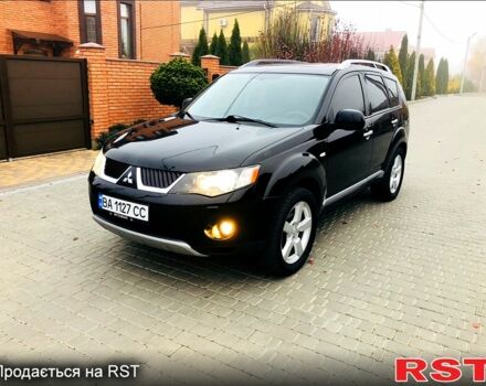 Черный Мицубиси Аутлендер, объемом двигателя 3 л и пробегом 230 тыс. км за 8999 $, фото 1 на Automoto.ua