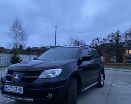 Чорний Міцубісі Аутлендер, об'ємом двигуна 2 л та пробігом 271 тис. км за 6799 $, фото 1 на Automoto.ua