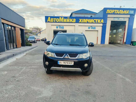 Чорний Міцубісі Аутлендер, об'ємом двигуна 2.36 л та пробігом 317 тис. км за 8200 $, фото 1 на Automoto.ua