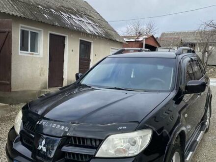 Мицубиси Аутлендер 2008 в Чемеровцах на Automoto.ua Черный Мицубиси Аутлендер, объемом двигателя 2 л и пробегом 196 тыс. км за 7000 $, фото 1 на Automoto.ua
