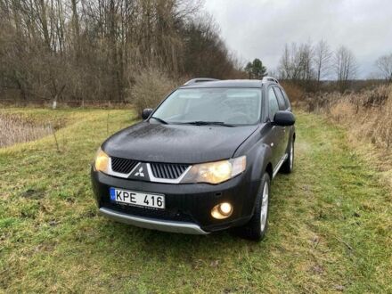 Чорний Міцубісі Аутлендер, об'ємом двигуна 2 л та пробігом 320 тис. км за 4200 $, фото 1 на Automoto.ua