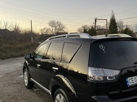 Чорний Міцубісі Аутлендер, об'ємом двигуна 2.2 л та пробігом 238 тис. км за 9700 $, фото 1 на Automoto.ua