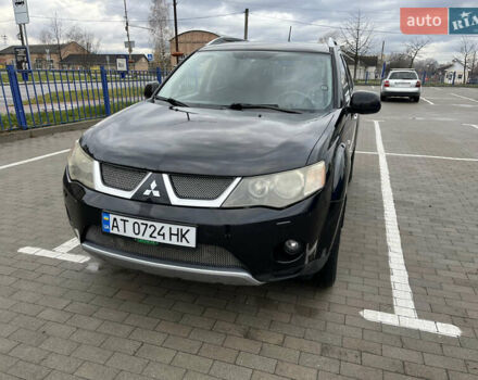 Черный Мицубиси Аутлендер, объемом двигателя 1.97 л и пробегом 244 тыс. км за 8700 $, фото 1 на Automoto.ua