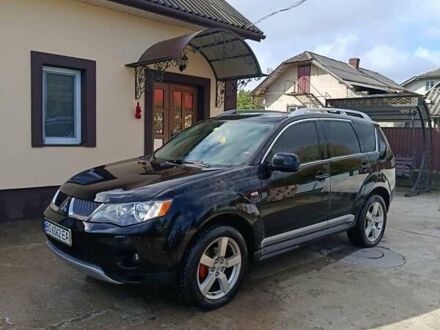 Чорний Міцубісі Аутлендер, об'ємом двигуна 2.36 л та пробігом 203 тис. км за 9200 $, фото 1 на Automoto.ua
