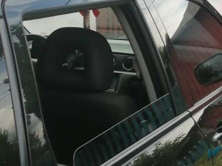 Чорний Міцубісі Аутлендер, об'ємом двигуна 2 л та пробігом 208 тис. км за 6700 $, фото 1 на Automoto.ua