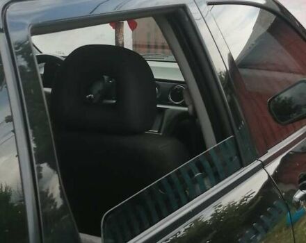 Черный Мицубиси Аутлендер, объемом двигателя 2 л и пробегом 208 тыс. км за 6700 $, фото 1 на Automoto.ua