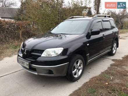 Мицубиси Аутлендер 2008 в Золотоноше на Automoto.ua Черный Мицубиси Аутлендер, объемом двигателя 2 л и пробегом 257 тыс. км за 7500 $, фото 1 на Automoto.ua