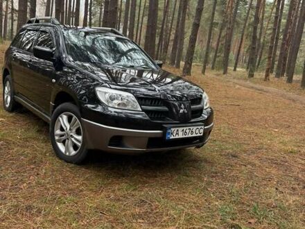 Чорний Міцубісі Аутлендер, об'ємом двигуна 2 л та пробігом 232 тис. км за 7000 $, фото 1 на Automoto.ua