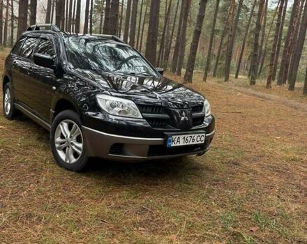 Чорний Міцубісі Аутлендер, об'ємом двигуна 2 л та пробігом 232 тис. км за 6500 $, фото 1 на Automoto.ua