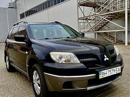 Мицубиси Аутлендер 2008 в Одессе на Automoto.ua Черный Мицубиси Аутлендер, объемом двигателя 2 л и пробегом 270 тыс. км за 5555 $, фото 1 на Automoto.ua