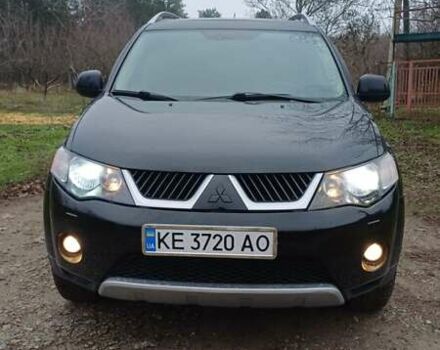 Черный Мицубиси Аутлендер, объемом двигателя 3 л и пробегом 152 тыс. км за 8700 $, фото 1 на Automoto.ua