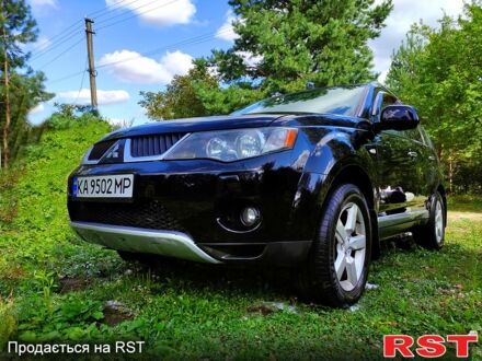 Чорний Міцубісі Аутлендер, об'ємом двигуна 3 л та пробігом 284 тис. км за 10000 $, фото 1 на Automoto.ua