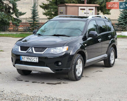 Чорний Міцубісі Аутлендер, об'ємом двигуна 2.4 л та пробігом 205 тис. км за 8400 $, фото 1 на Automoto.ua