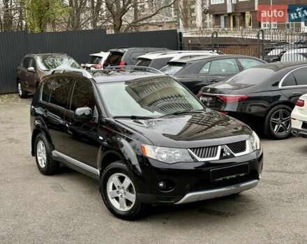 Черный Мицубиси Аутлендер, объемом двигателя 2.4 л и пробегом 185 тыс. км за 7900 $, фото 1 на Automoto.ua