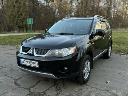 Чорний Міцубісі Аутлендер, об'ємом двигуна 1.97 л та пробігом 300 тис. км за 8600 $, фото 1 на Automoto.ua