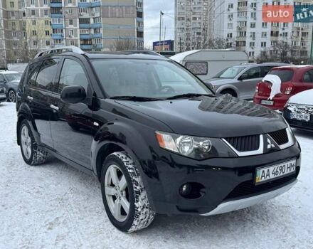Черный Мицубиси Аутлендер, объемом двигателя 3 л и пробегом 220 тыс. км за 7999 $, фото 1 на Automoto.ua