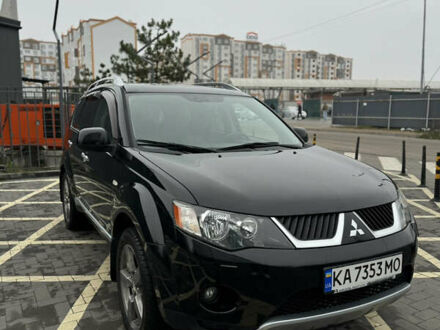 Черный Мицубиси Аутлендер, объемом двигателя 2.36 л и пробегом 120 тыс. км за 10100 $, фото 1 на Automoto.ua