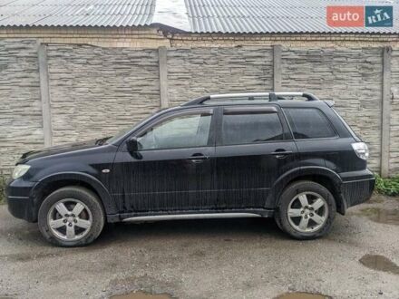 Міцубісі Аутлендер 2008 у Вишневом на Automoto.ua Чорний Міцубісі Аутлендер, об'ємом двигуна 2.4 л та пробігом 490 тис. км за 9000 $, фото 1 на Automoto.ua
